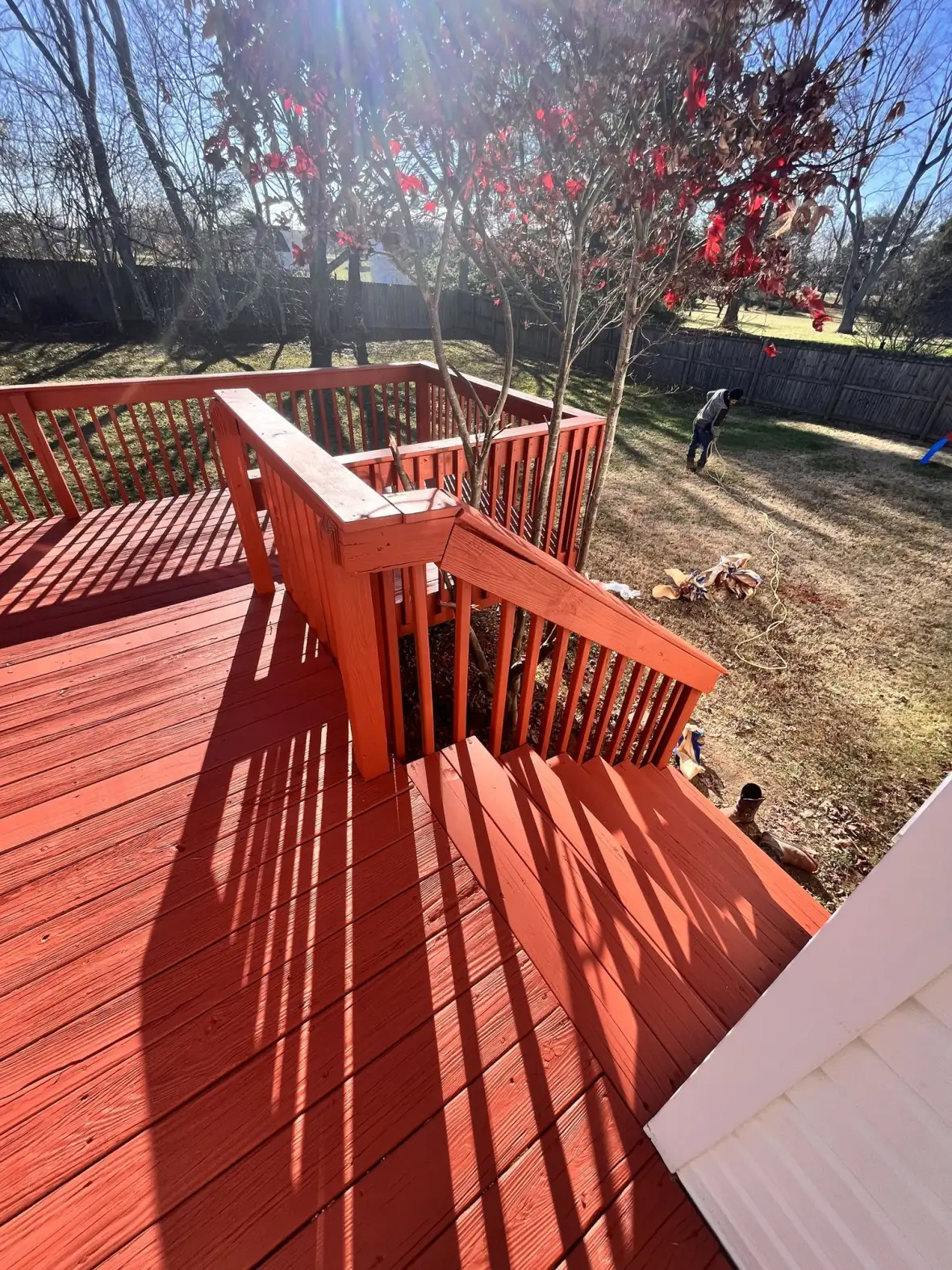 Freshly stained wood deck and railing
